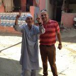 Odeh poses for a photo with a camp elderly - Burj El Barajneh Beirut